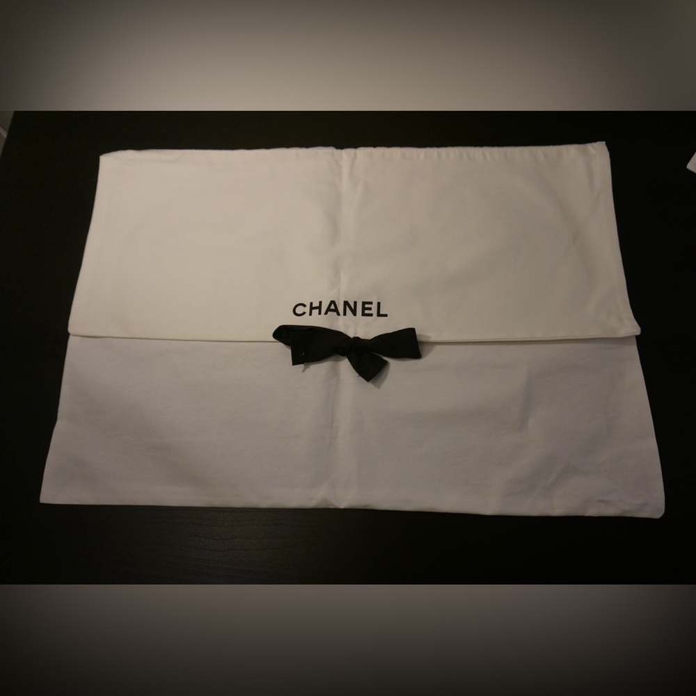 Authentic CHANEL White Dust Bag with Black Bow